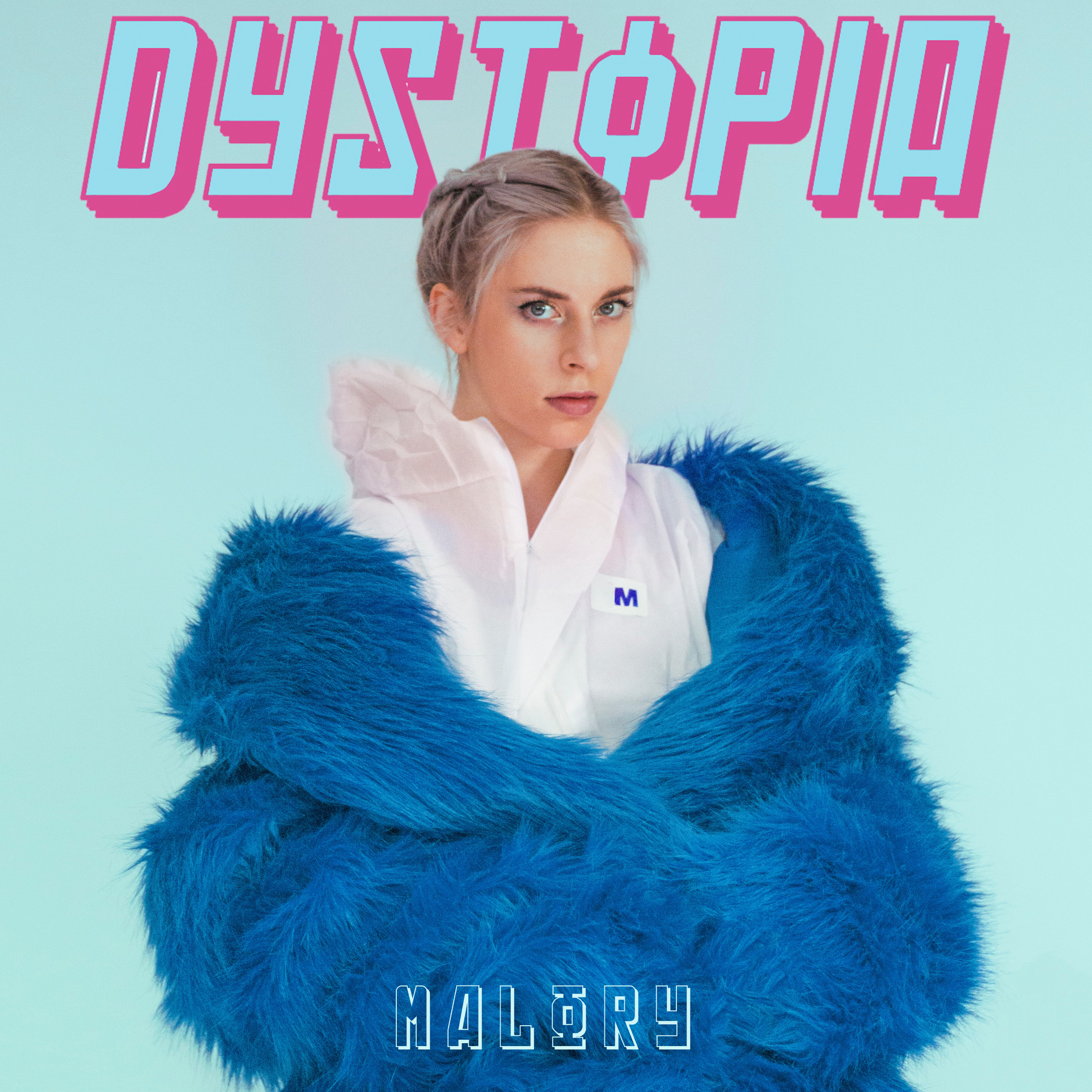 Malory posing in a blue fluffy coat with the album title "Dystopia" in the background in big pink capital letter
